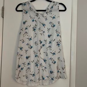 Mixed media floral sleeveless top with lace up back